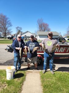 A group of 3 people fishing in Wisconsin Rapids