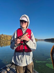 Angler with fishing rod enjoying the outdoors in WI