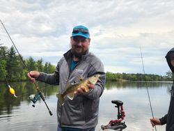 A lone angler fishing on the water in WI