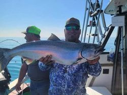Angler with a big rainbow trout in Wisconsin Rapids