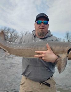 Angler with a 23-inch fish in WI