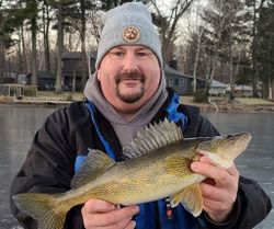 Angler holding 17-inch fish in WI