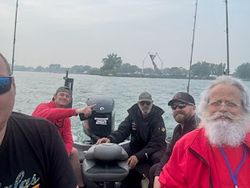 Four people fishing at St. Clair Shores