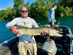 Angler holding a 30-inch fish in St. Clair Shores