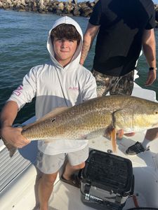 A person fishing in FL