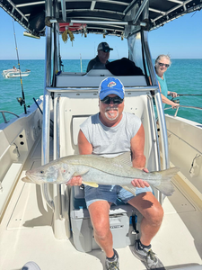 Chasing the big one on the open waters.