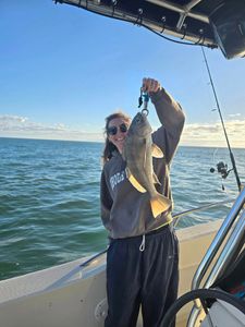 Fisherman with a large 22-inch catch in Sebastian, Florida