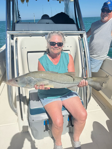 Reeling in the big one on the open waters!
