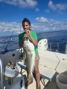 Reeling in a great catch on the open seas!