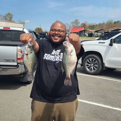 Two crappie fish displayed after successful fishing trip in King George VA