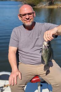 Freshly caught crappie being held up after successful fishing trip in King George VA