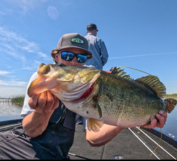 A person fishing in FL with a 20-inch fish
