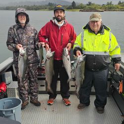 Five fish including Rainbow Trout, Chinook Salmon, and Coho Salmon caught fishing in Coos Bay