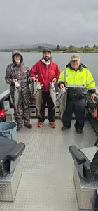 Fishing charter boat on water in Coos Bay Oregon with multiple species catch