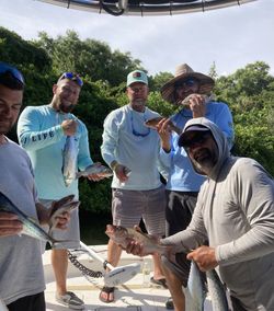 An image of 5 people fishing in St. Petersburg
