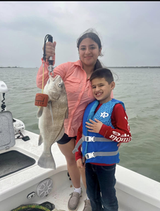 Angler with a 20-inch Black Drum fish in TX