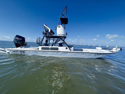 Scenic view of Corpus Christi coastline with fishing rods