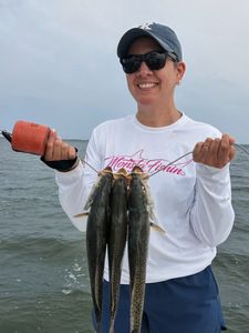 Fresh caught fish on fishing stringer displayed in Corpus Christi TX waters