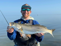 Angler holding a 23-inch fish in TX