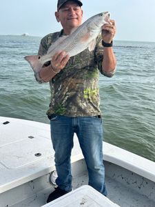 Angler with 17-inch redfish caught in TX