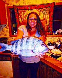 One fisherman with a big 22-inch catch on Folly Beach