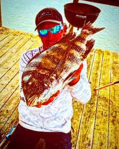 Single angler fishing at Folly Beach