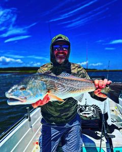 Angler with 25-inch fish on Folly Beach