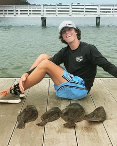 Two small fishing rods with catch in South Carolina
