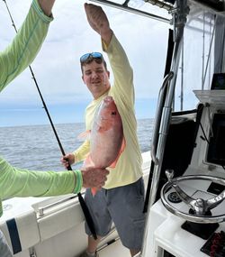 A person fishing on the beach in Fernandina Beach
