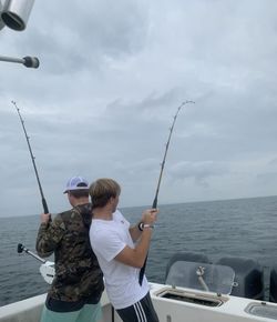 Person fishing on the beach in FL