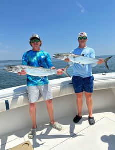 Two king mackerel measuring 28 inches caught while fishing in FL