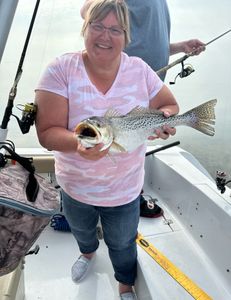 A person fishing in Manteo