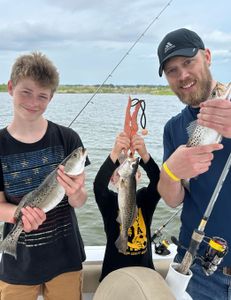 Two spotted weakfish caught during fishing in Manteo
