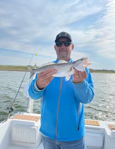 Image of a 16-inch spotted weakfish caught while fishing in Wanchese