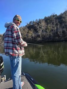 Fisherman enjoying a great day of fishing in Branson
