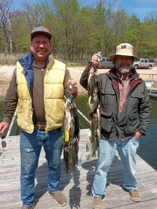 Two anglers enjoying a fishing trip in Pittsburg