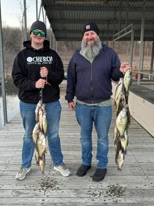 Two anglers enjoying a fishing trip in Pittsburg