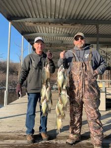 Two white crappie fish caught while fishing in MO