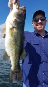 Angler with a big fish in Alba