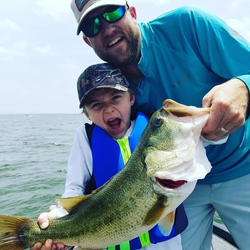 Two people fishing in Alba