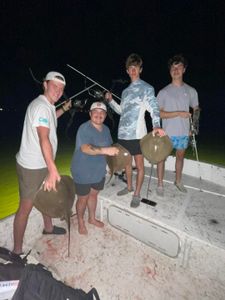 Four people fishing in FL
