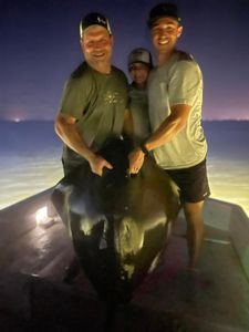 A group of 3 people enjoying fishing at Panama City Beach