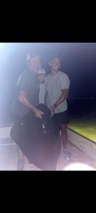 Three people enjoying a fishing trip in Panama City Beach