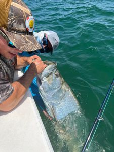 One person fishing in Placida