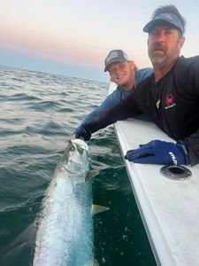Two people enjoying a great fishing trip in Placida