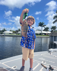 Two anglers with a fish in FL