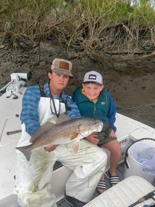 Redfish caught by two anglers at Edisto Beach