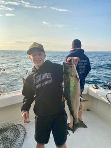 Angler catching a big fish in NY