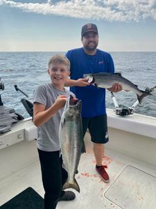 Two anglers fishing with rods in Olcott