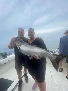 Two people fishing in Olcott, with a 39-inch catch
